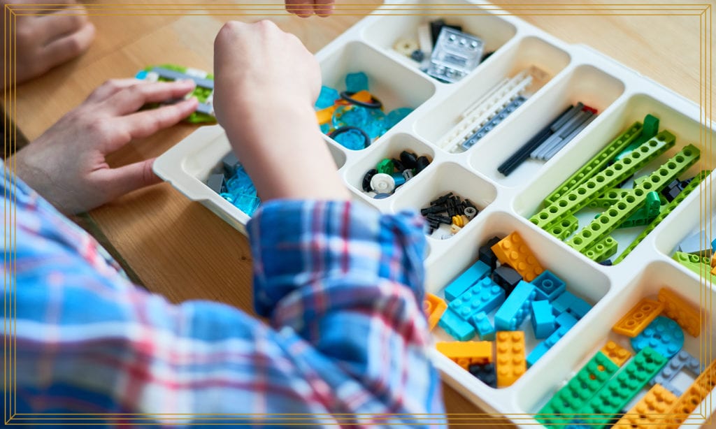 kid playing legos