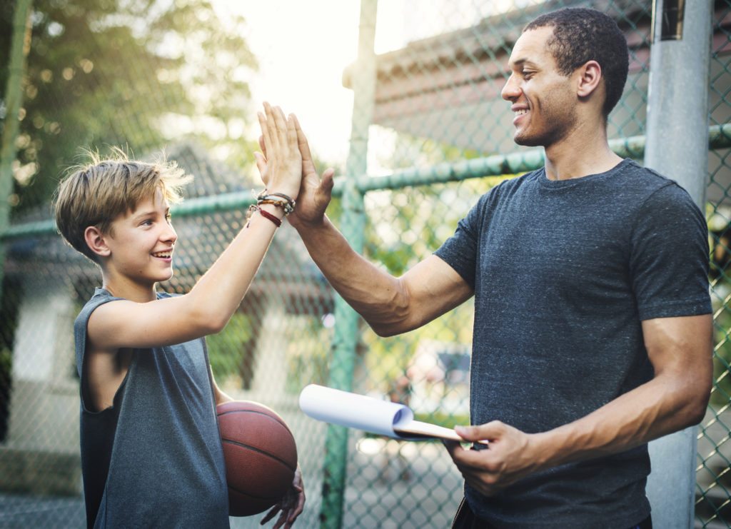 kid-high-five-coach