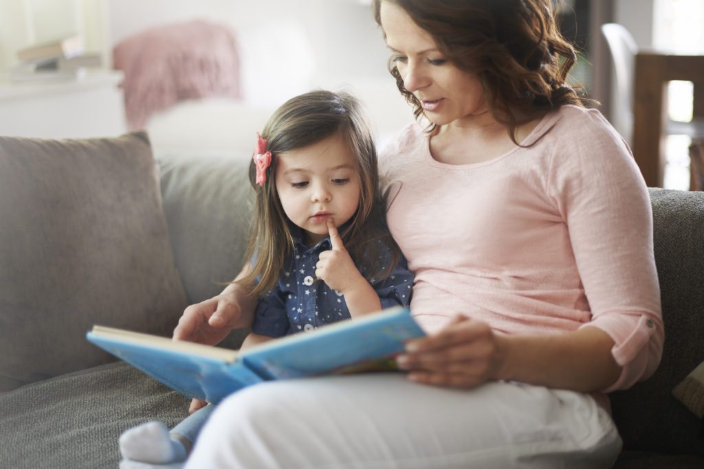 mom-reading-book-with-daughter