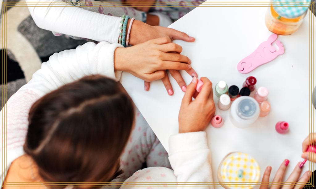 girl painting nails